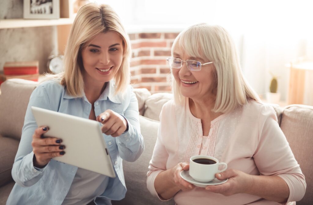 A mother and daughter discussing senior living community options.